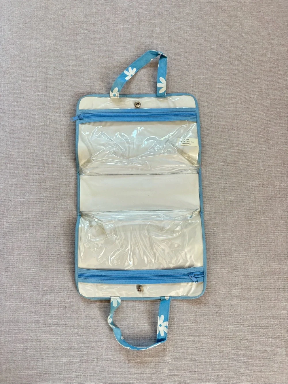Vintage blue daisy boho vinyl clutch pouch.